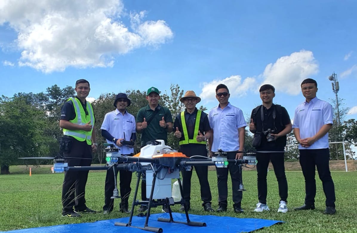 NK Robotics team with an agricultural drone in the field